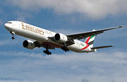An Emirates Airline 777-300ER landing at London Heathrow Airport