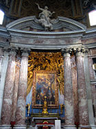 The Church of Sant'Andrea al Quirinale, designed by Gian Lorenzo Bernini, is a very good example of Baroque architecture with its domed roof and curved contours, and is also a fine example of Baroque painting with the shown altar, which portrays a very dramatized painting of Saint Andrew being crucified.