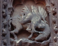 Depiction of Pride on the left pillar of the central bay of the south porch of Chartres Cathedral