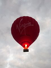 A Virgin hot air balloon flying over Cambridge.