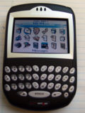 BlackBerry 7250, offered by Verizon Wireless.  An identical model is offered by Sprint.  This model offered tethering capability, allowing connection of the BlackBerry to a laptop for use as a high speed internet connection.