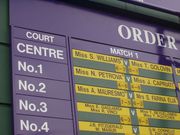 The order of play for all courts is displayed on boards around the grounds