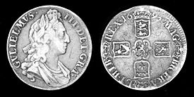 Silver crown coin of William III, dated 1695.  The Latin inscription is (obverse) GVLIELMVS III DIE GRAB[tia] (reverse) MAG[nae] BR[itanniae], FRA[nciae], ET HIB[erniae] REX 1695. English: "William III, By the grace of God, King of Great Britain, France, and Ireland, 1695."  The reverse shows the arms, clockwise from top, of England, Scotland, France, and Ireland, centered on William's personal arms of the House of Orange-Nassau.