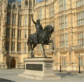 This bronze equestrian statue of Richard I brandishing his sword by Carlo Marochetti stands outside the Palace of Westminster in London.