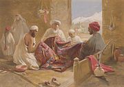 A Muslim shawl making family shown in Cashmere shawl manufactory, 1867, chromolith., William Simpson.