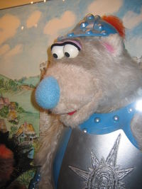 Basil the Bear from Canada's Sesame Park, in a knight's armour. The puppet, as well as most of the series cast, is displayed at the CBC Museum.