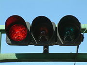 A traffic light showing red.