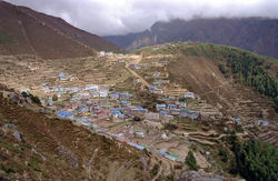 The famous outpost of Naamche Bazaar in the Khumbu region close to Mount Everest. The town is built on terraces in what resembles a giant Greek theatre.