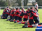 The England national rugby union squad in a group hug, during training for the 2007 Rugby World Cup at the University of Bath training ground.