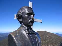 Bust of Duarte on top of Pico Duarte, with La Pelona in the background.