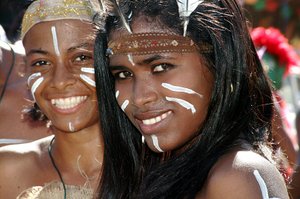 Dominican girls at carnival in Taíno garments and makeup (2005).