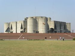 Jatiyo Sangshad Bhaban houses the Parliament of Bangladesh.