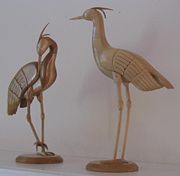 Artists can use woodworking to create delicate sculptures.