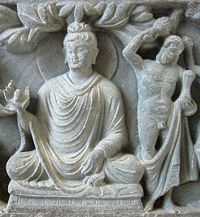 An example of the fusion of Greek and Indian Buddhist styles in the Gandhara style: Representation of Buddha with Herakles
