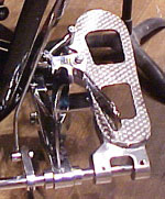 This pedal is on a Dresden timpano. The timpanist must disengage the clutch – seen here on the left of the pedal – to change the pitch of the drum.