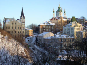General view of the Andriyivskyy Descent with the Castle of Richard Lionheart on the left and the St Andrew's Church in the background.