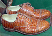 Shoes made from real crocodile skin, in a conservation exhibit at Bristol Zoo, England.