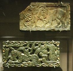 Chinese jade and steatite plaques, in the Scythian-style animal art of the steppes. 4th-3rd century BC.British Museum.