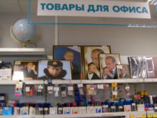 Portraits of President Putin on display in a Moscow store.