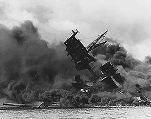 The USS Arizona ablaze after the Japanese attack on Pearl Harbor
