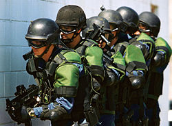 Many law enforcement agencies have heavily armed units for dealing with dangerous situations, such as these U.S. Customs and Border Protection officers.