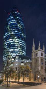 30 St Mary Axe. Scenes of contrast between new and old are common in the City.