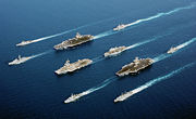 Four modern aircraft carriers of various types –  USS John C. Stennis, FS Charles de Gaulle, HMS Ocean and USS John F. Kennedy — and escort vessels on operations in 2002. The ships are sailing much closer together than they would during combat operations.