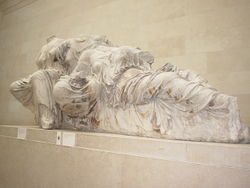 Ancient Greek sculpture. A portion of the Parthenon Pediment, displayed in the British Museum.
