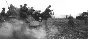 Soviet tanks and infantry pressing on the Germans near Budapest.