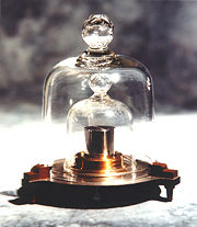 K48 came from the second batch of kilogram replicas to be produced. It was delivered to Denmark in 1949 with an official mass of 1 kg+81 µg. Like all other replicas, it is stored under two nested bell jars virtually all the time. Still, its mass and that of the IPK diverged markedly in only 40 years; the mass of K48 was certified as 1 kg+112 µg during the 1988–1992 periodic verification.