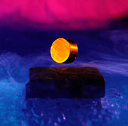 A magnet floating above a superconductor bathed in liquid nitrogen demonstrates perfect diamagnetic levitation via the Meissner effect. Experiments with an ampere-based definition of the kilogram flipped this arrangement upside-down: an electric field accelerated a superconducting test mass supported by fixed magnets.