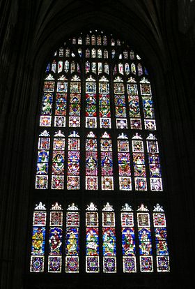 A large Perpendicular style Gothic window of eight lights in Canterbury Cathedral, c. 1400, which contains medieval glass.