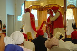 The anand kāraj (Sikh marriage) ceremony.