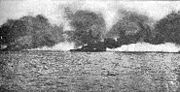 HMS Lion burning during the Battle of Jutland, after having been hit by a salvo from SMS Lützow.