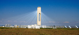 The PS10 solar power tower near Seville concentrates sunlight from a field of heliostats on a central tower.