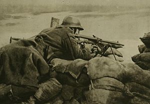 A Belgian machinegunner on the front lines in 1918.