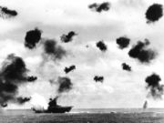 Yorktown hit by an aerial torpedo.
