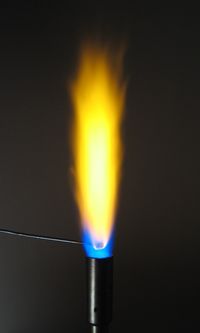 The flame test for sodium displays a brilliantly bright yellow emission due to the so called "sodium D-lines" at 588.9950 and 589.5924 nanometers.