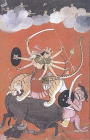 Mother Goddess Durga slays a demon.