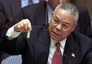 Then United States Secretary of State Colin Powell holds a model vial of anthrax while giving a presentation to the United Nations Security Council in February 2003. Foreign ministers and heads of government often appear in the UNSC in person to discuss issues.