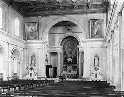 In the classically simple interior of "The Sacred Heart", the altar is given prominence by Serlian arches.The columns in the nave are ionic, supporting a clerestory.
