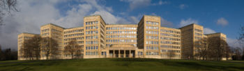 Panorama of the Poelzig building from the south, demonstrating how the curved shape of the building's façade reduces the impact of its scale