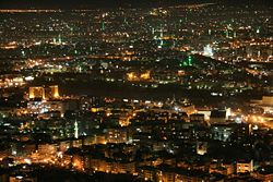 Damascus by night, pictured from Jabal Qasioun; the green spots are minarets