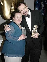 Scottish award-winning film and TV actress Paula Sage receives her BAFTA award with Brian Cox: Photograph by Alan Wylie.