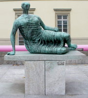 This bronze figure in Stuttgart is typical of Moore's earlier reclining figures.
