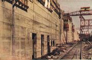 Pedro Miguel Locks under construction, early 1910s, showing center wall and intakes, looking north.