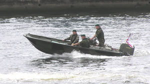 Royal Marines in a Rigid Raider assault watercraft