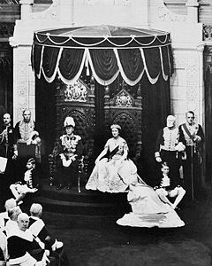 George VI, King of Canada, and his consort, Elizabeth, occupy the thrones in the Senate, while the king grants royal assent to laws, May 19, 1939.