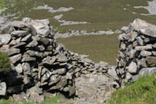 Entrance through the dry-stone rampart, Tre'r Ceiri hillfort, Gwynedd