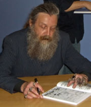 Alan Moore, whose works have done much to popularise the medium.
